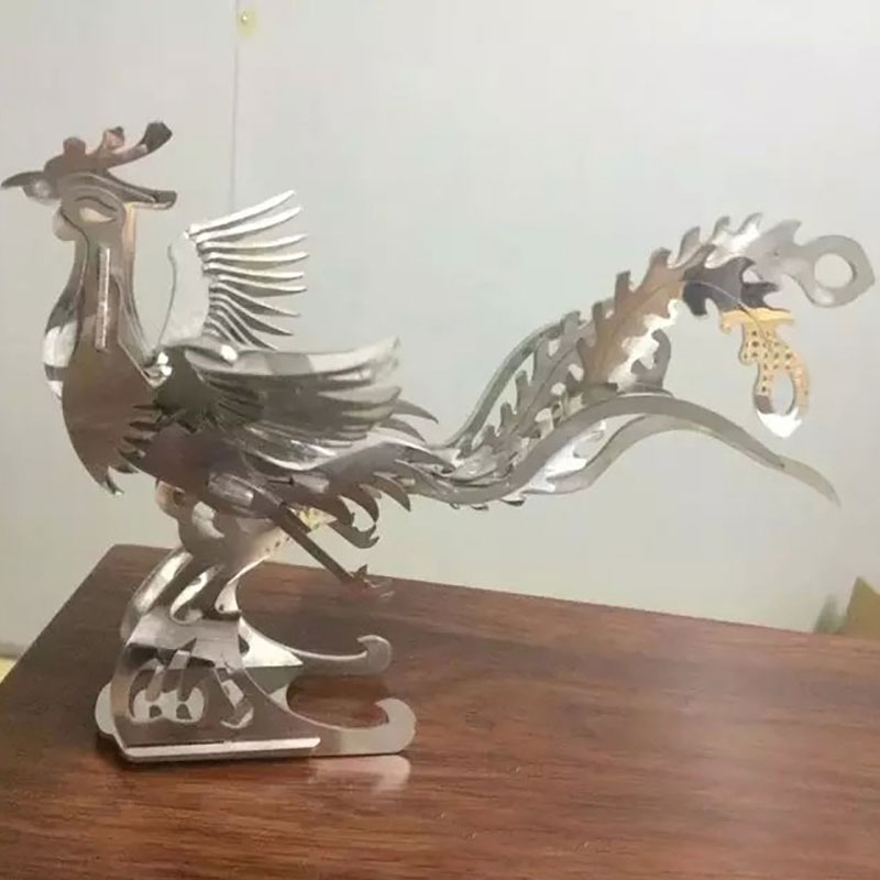 Laser engraving phoenix statue