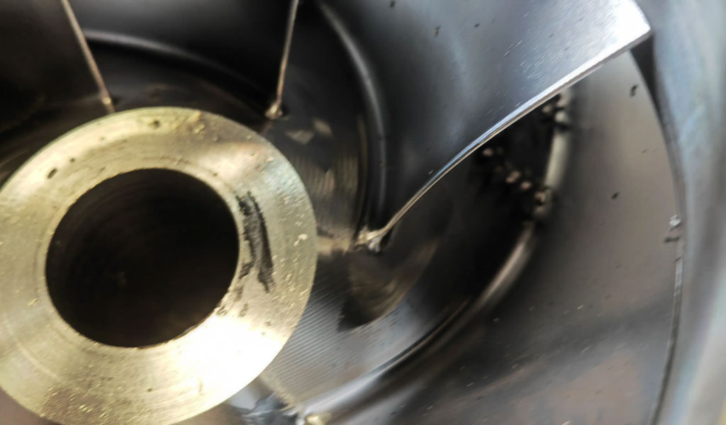 Interference Checking in CNC Machining of Impellers