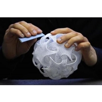 3D printing of thermoplastic materials using embedded media in free form